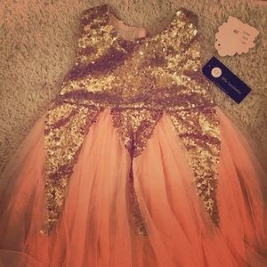Girls dress with gold sequins